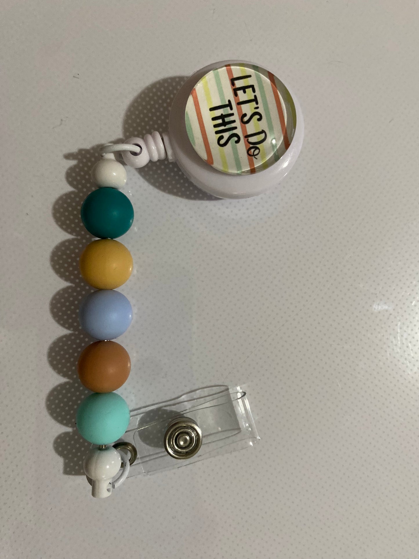 “Let’s Do This” badge reel holder