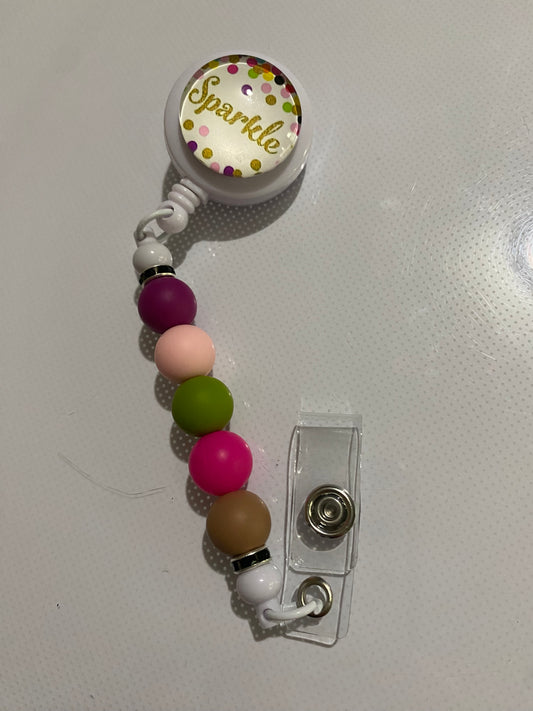 “Sparkle” badge reel holder