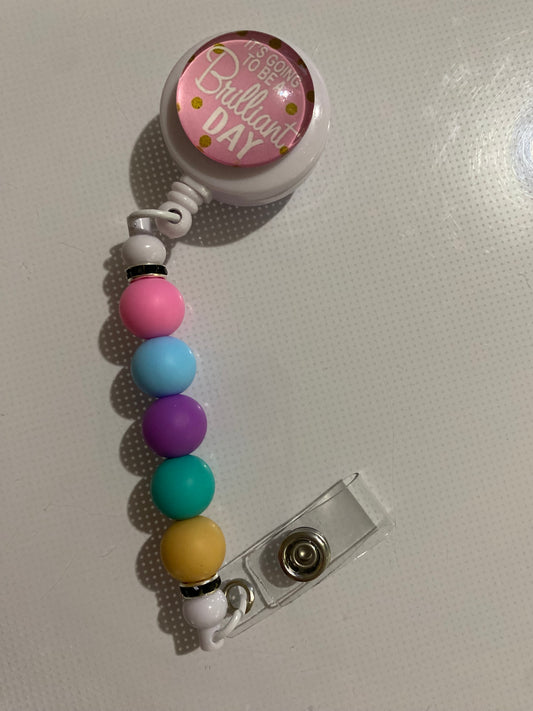 “It’s Going to be a Brilliant Day” badge reel holder