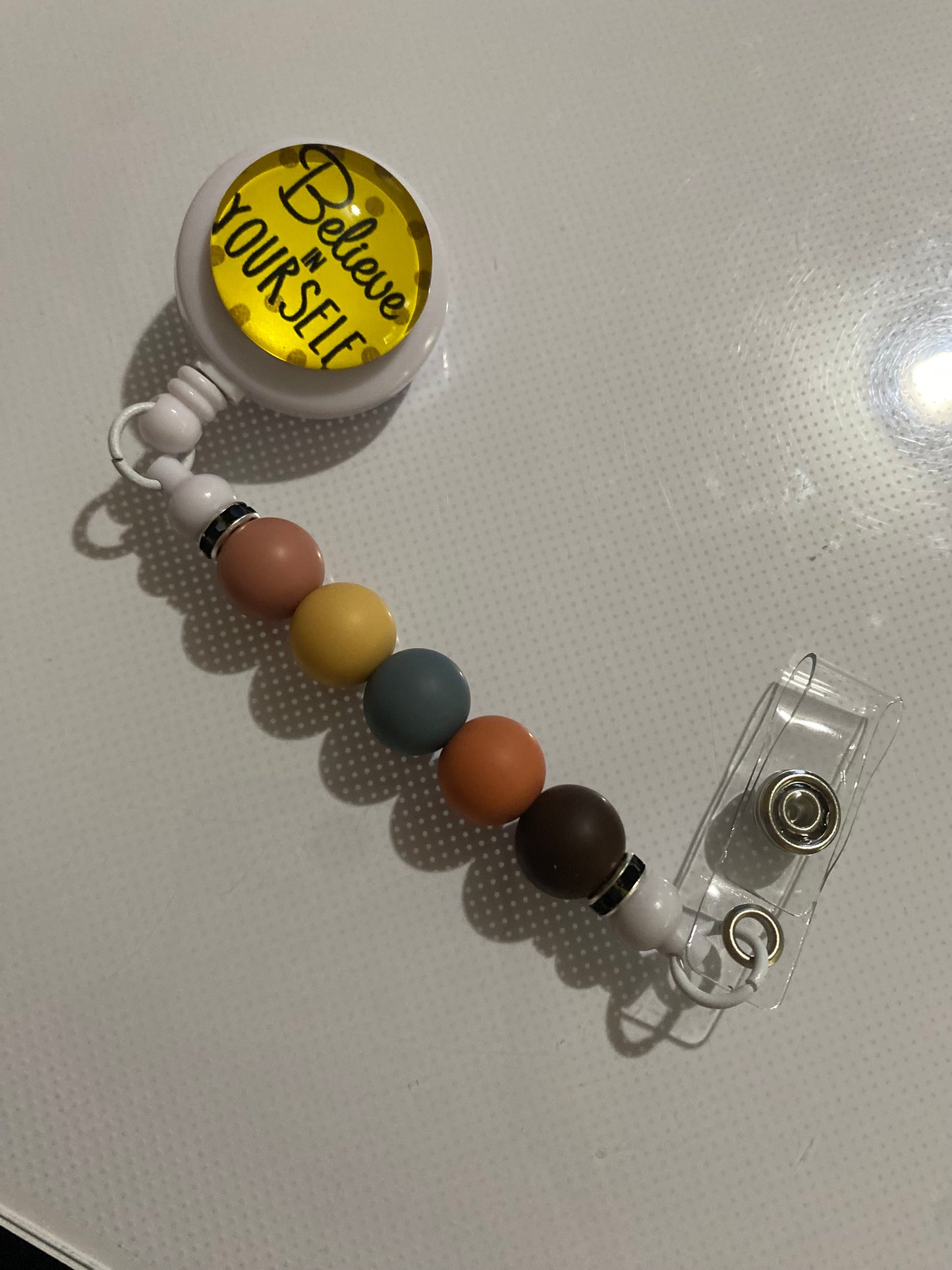 “Believe in Yourself” badge reel holder