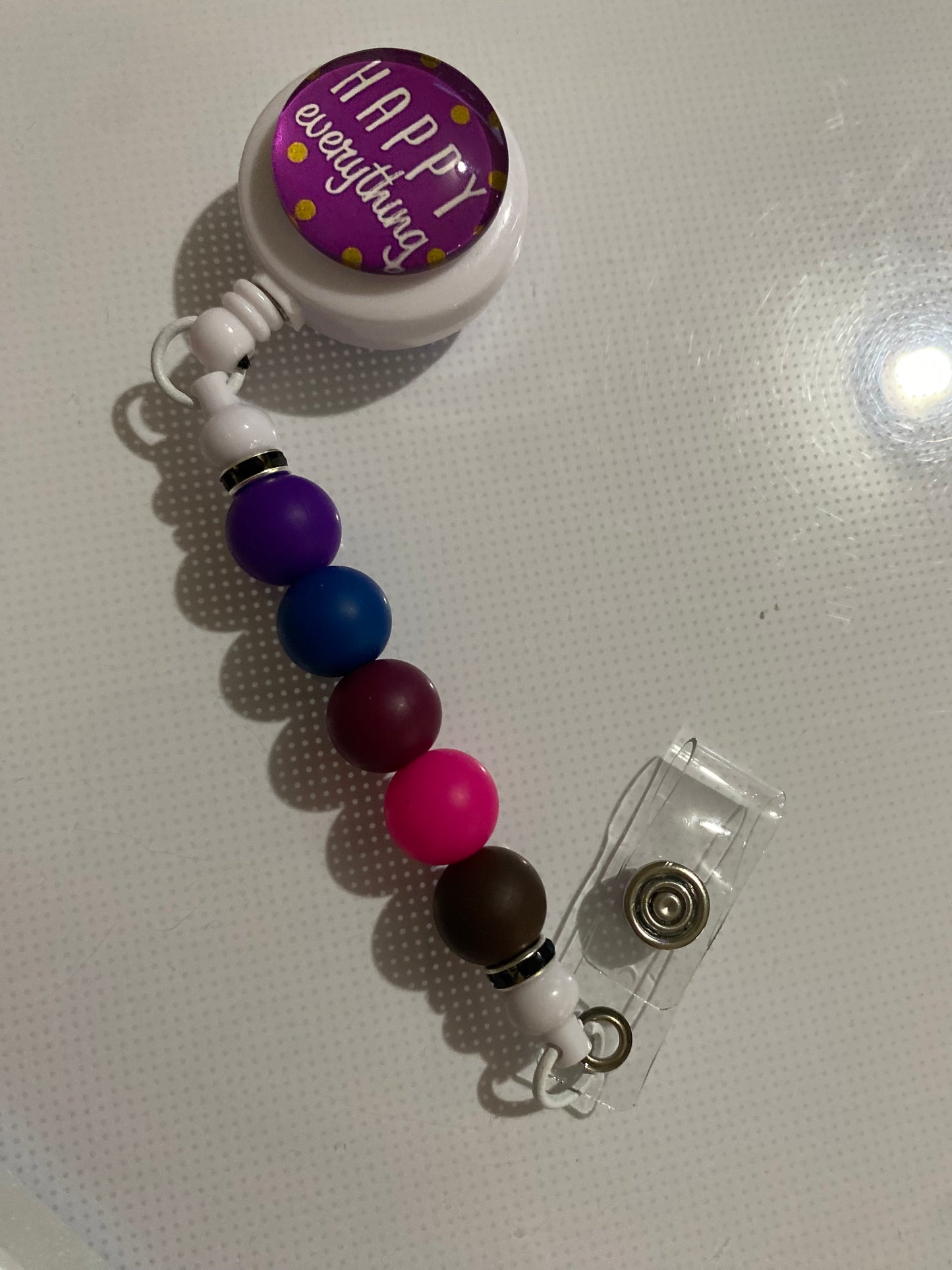 “Happy Everything” badge reel holder