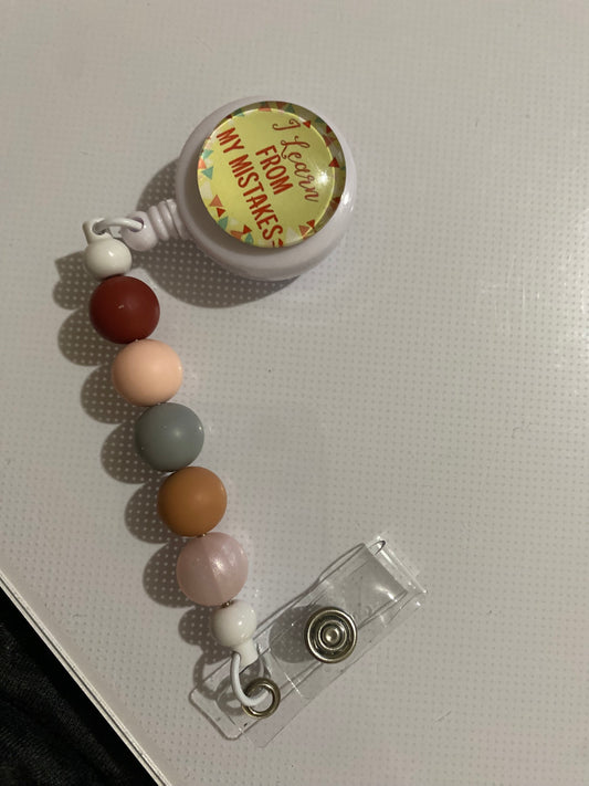 “I Learn from my Mistakes” badge reel holder