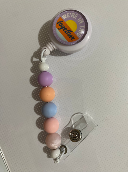 “We’re In This Together” badge reel holder